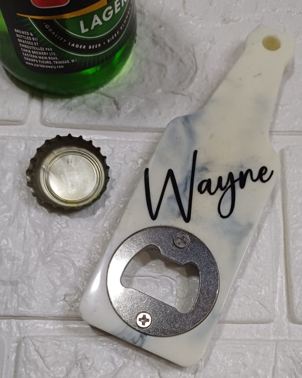 Personalised resin opener wit name in white and black pattern